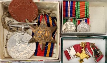 A small group of WWII medals, etc.