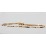 An 18ct rose gold diamond set tennis bracelet, approx. 1.5ct total, L. 19.5cm.