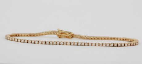 An 18ct rose gold diamond set tennis bracelet, approx. 1.5ct total, L. 19.5cm.