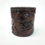 A Chinese carved hardwood brush pot, Dia. 12cm, H. 13cm.