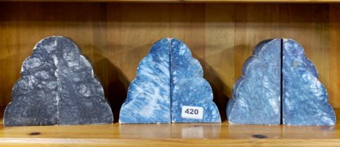 Three pairs of polished stone bookends, H. 15cm.