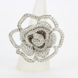 An impressive 18ct white gold flower shaped ring set with brilliant cut diamonds, approx. 3.5ct,