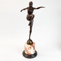 A large Art Deco style figure of a dancer on a marble base, H. 54cm.