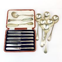 A quantity of hallmarked silver cutlery with a set of silver handled butter knives.