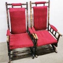 A pair of turned oak red upholstered rocking chairs, H. 105cm.