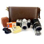 A cased Wirgin Edixa single lense reflex camera with Novoflex adjustable lens with bellows.