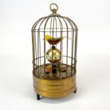 A novelty brass birdcage clock, H. 18cm.