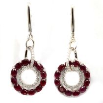 A pair of 925 silver drop earrings set with oval cut rubies and white stones, L. 4.8cm.