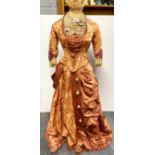A Victorian silk crinoline dress on a bamboo mannequin, overall H, 129cm.