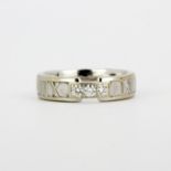 A Tiffany & Co 19ct white gold ring set with brilliant cut diamonds, (O.5).