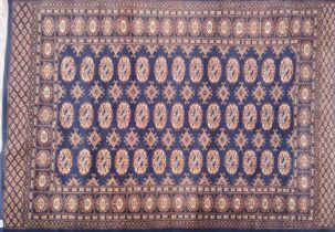 A blue ground Eastern wool rug, 190 x 127cm.