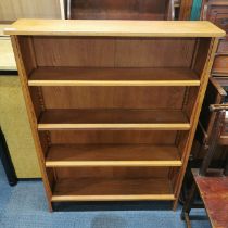 An oak bookshelf, 127 x 93cm.