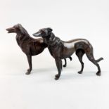 A pair of bronze dogs, H. 16cm.