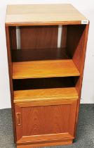 A 1980's G-plan Fresco teak record cabinet, 101 x 48 x 47cm.