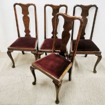 A set of four early 20th century dining chairs.