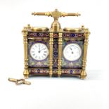 A bronze and enamelled double clock barometer, H. 13cm, W. 13cm.