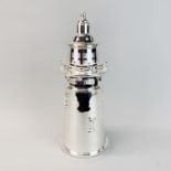 A large silver plated lighthouse cocktail shaker, H. 34cm.