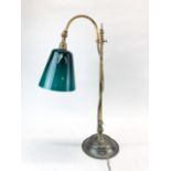 A brass desk lamp, H. 58cm.
