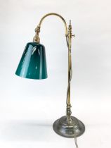 A brass desk lamp, H. 58cm.