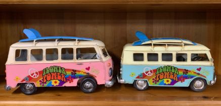Two handmade metal models of camper vans, L. 26cm.