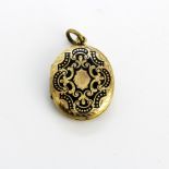 An antique yellow metal ( tested gold faced on metal frame) and enamel mourning locket pendant, L.