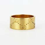 An 18ct yellow gold Gucci wide band ring, (N).