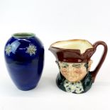 A Royal Doulton stoneware vase, H. 17cm. together with a large Royal Doulton character jug of Old