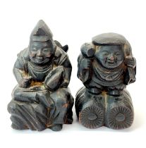 Two early 20th century carved wooden figures, H. 15cm.