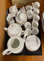 A porcelain coffee set and tray.