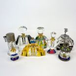 A group of crystal perfume bottles, tallest 11cm.