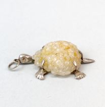 An unusual white metal mounted rock crystal turtle pendant, L. 5cm.