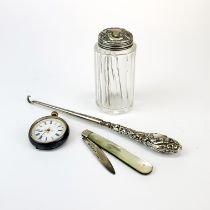 A hallmarked silver and mother of pearl fruit knife with a silver handled button hook, silver topped