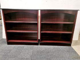 A pair of stained mahogany coloured bookshelves, 93 x 87 x 40cm.