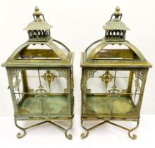 A pair of rectangular gilt metal and glass storm lanterns, H. 56cm.