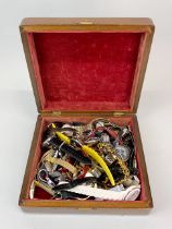 A box of mixed watches.