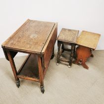 An oak drop leaf two tier tea trolley together with two small oak side tables, trolley 68 x 68cm.