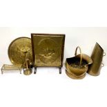 A group of mixed brass fire side items.