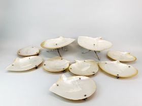 A superb polished shell and white metal cake set presented during WWII in Burma but originating from
