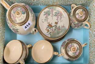 An early 20th century Japanese Kutani porcelain part tea set.