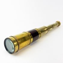 A 19th/ early 20th century six drawer brass and wood telescope, closed L. 15cm. open L. 53cm.