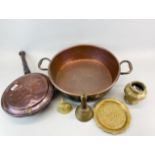 A large copper pan with a copper bed warmer and three brass items, pan dia. 44cm.