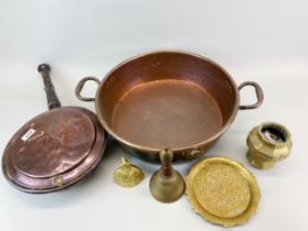 A large copper pan with a copper bed warmer and three brass items, pan dia. 44cm.