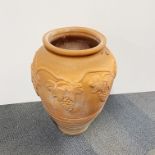 A large handmade terracotta garden pot, H. 62cm.