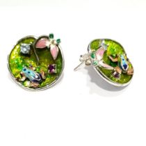 A pair of 925 silver enamelled earrings set with blue topaz, shaped as a frog on a water lily,