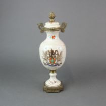 An armorial porcelain jar and cover, H. 31cm.