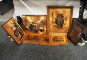 A group of copper wall plaques, Largest 33 x 41cm.