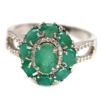 A matching 925 silver cluster ring set with oval cut emeralds, (O).