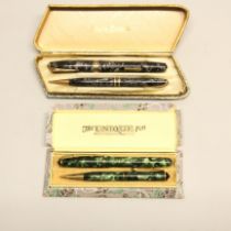 A boxed Conway Stewart fountain pen and propelling pencil with 14ct nib, together with a boxed