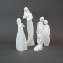 A four Royal Doulton porcelain Images figurines, tallest H. 29cm.