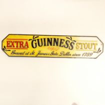 A cast iron advertising sign, W. 66cm.